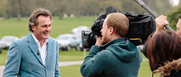 Paul Martin records a piece to camera at a Flog It! valuation day event